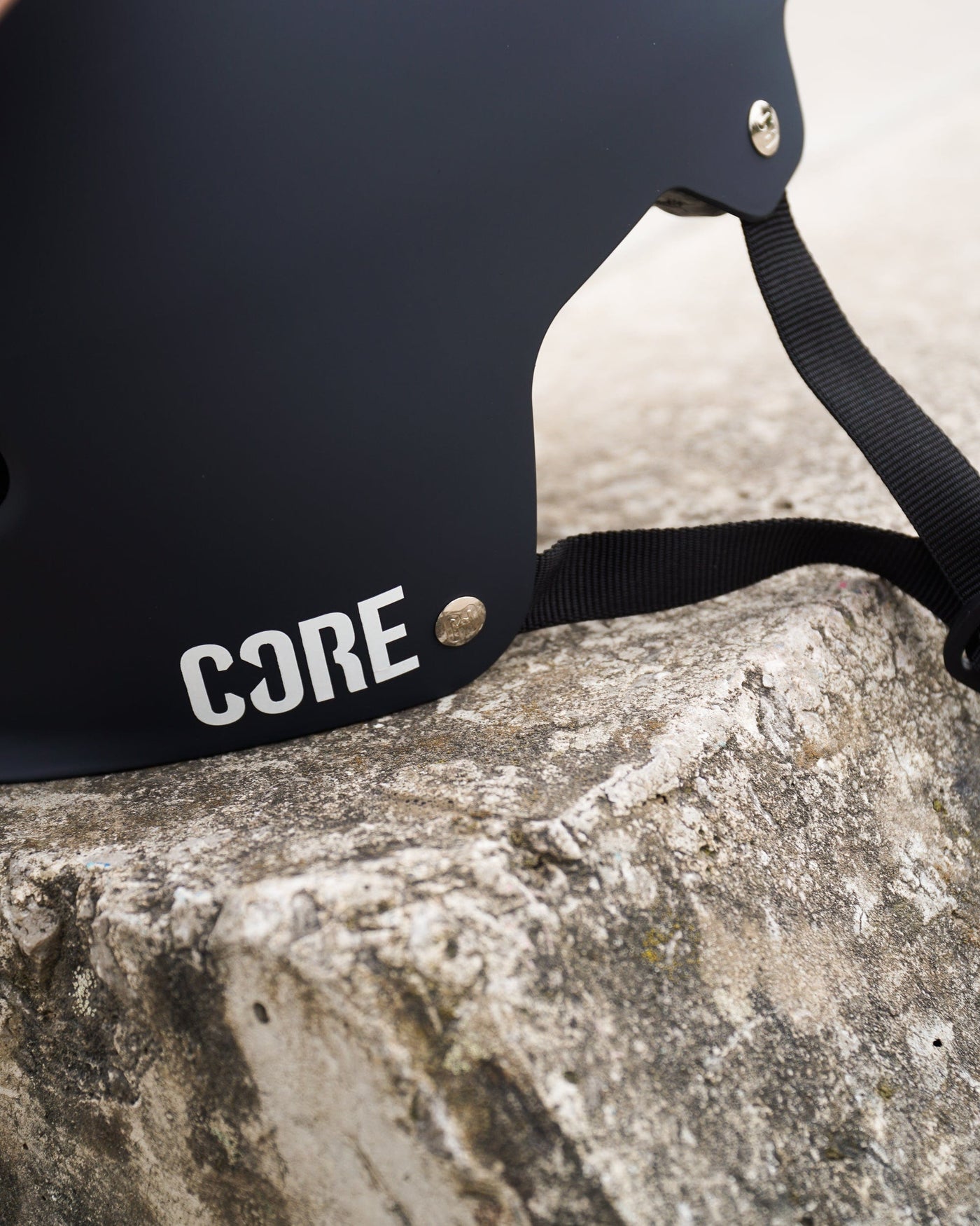 CORE Action Sports BMX Helmet Grey I Skateboard Helmet Zoomed In Skatepark