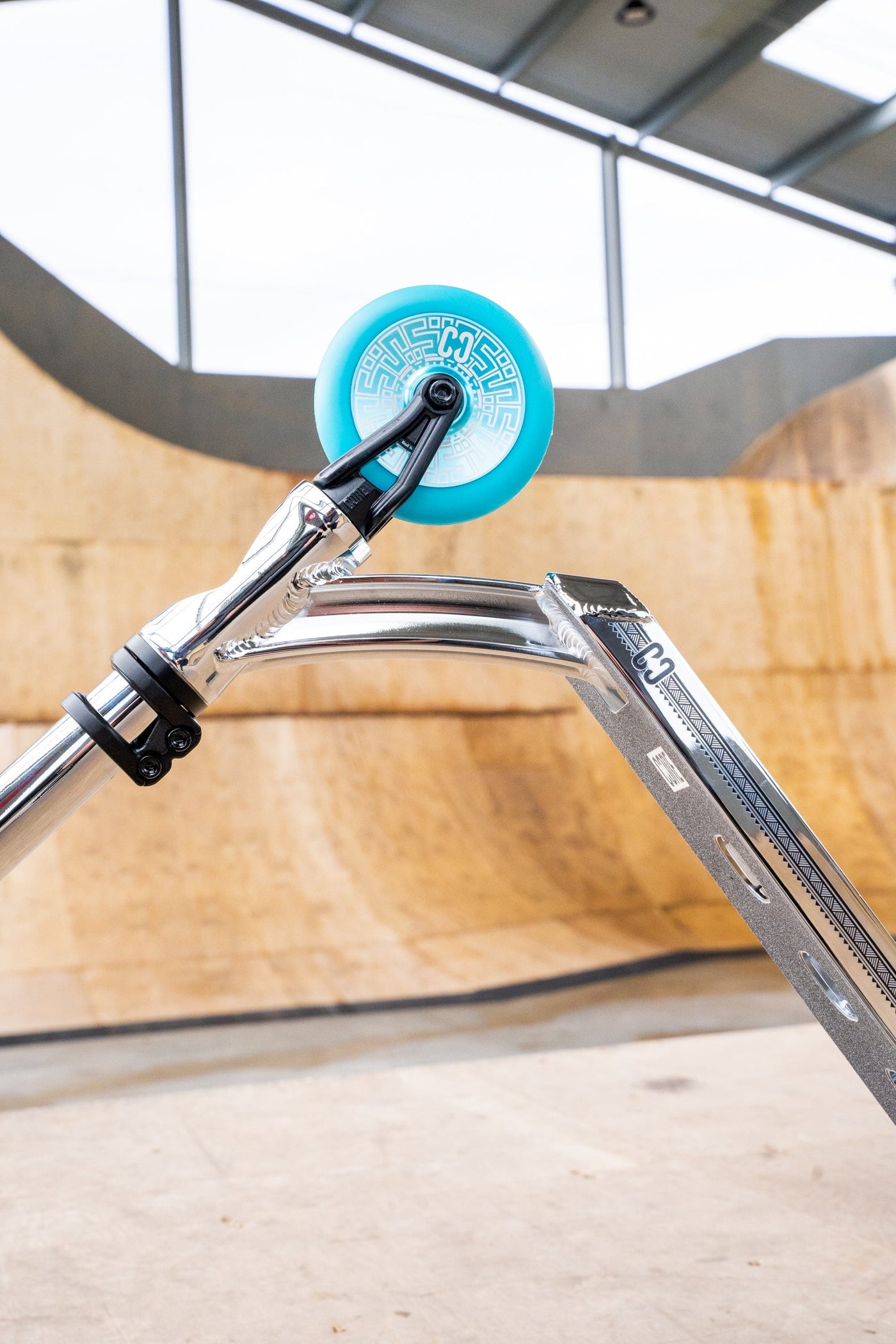 CORE CL1 Complete Stunt  Scooter Chrome & Teal I Adult Stunt Scooter Front Wheel Side Angle