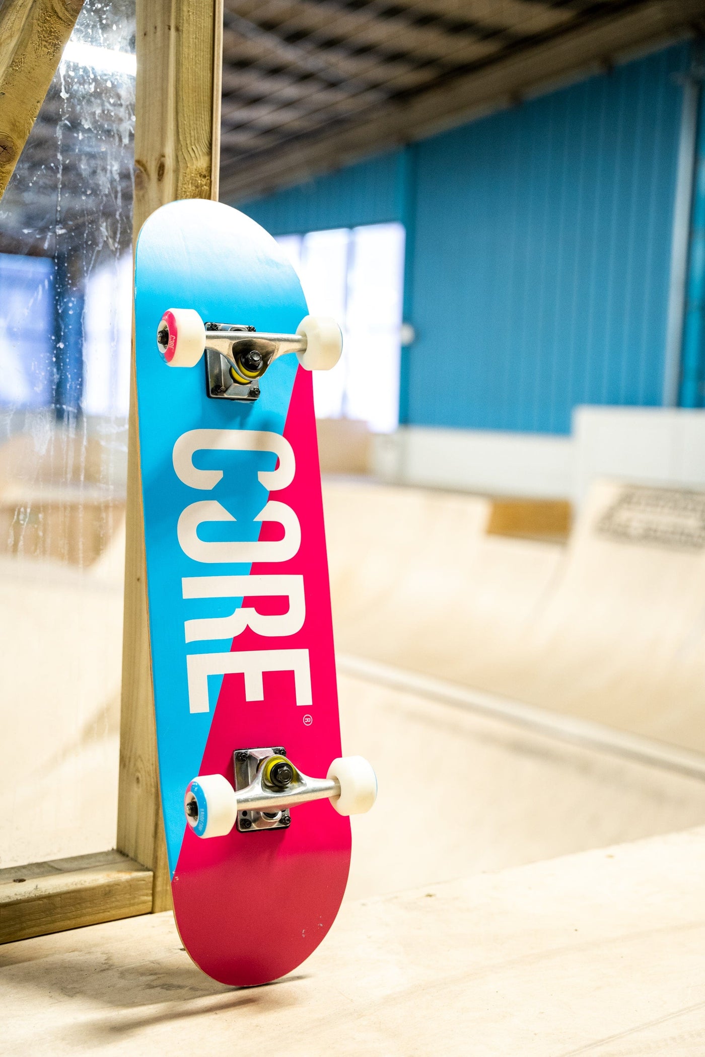 CORE Complete Skateboard C2 Split Pink & Blue 7.75 I Complete Skateboards Leaning