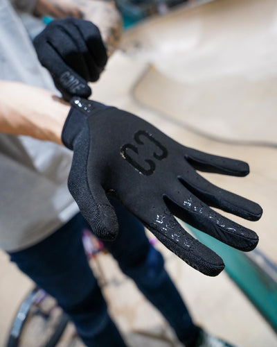 CORE Protection Aero BMX Gloves Stealth I Bike Gloves Putting Product On