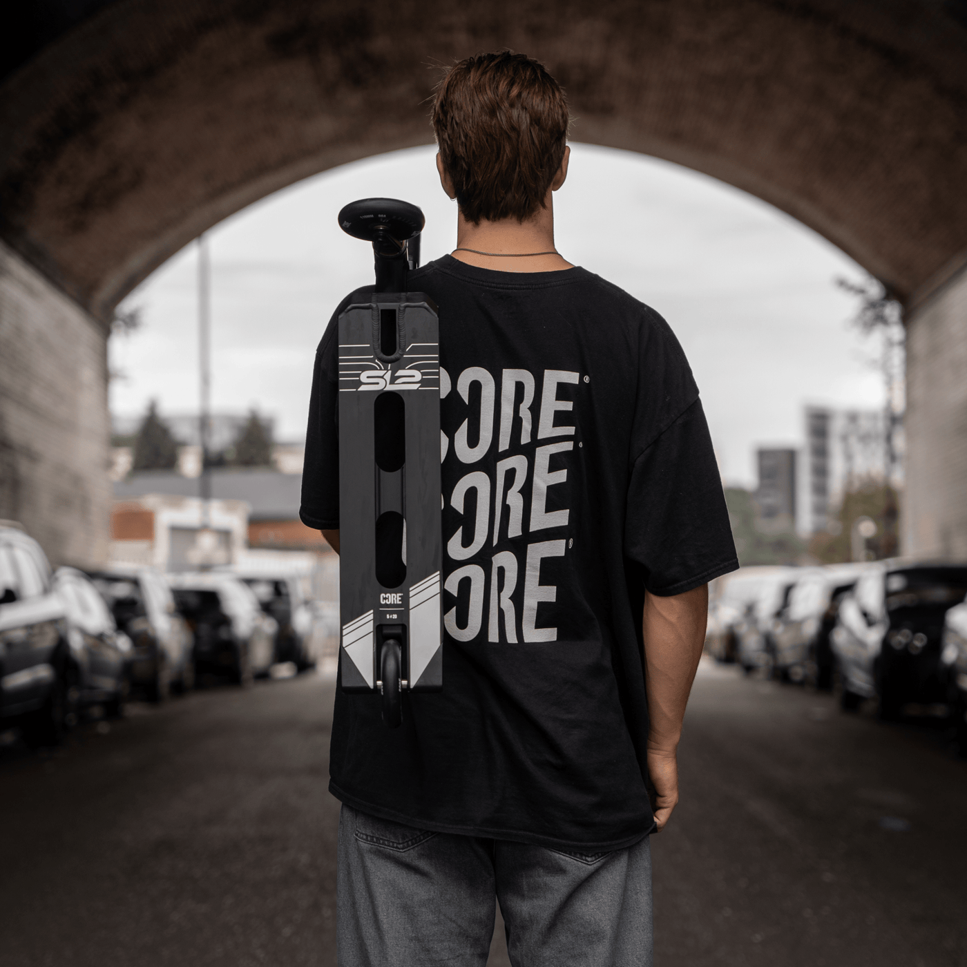 CORE SL2 Stunt Scooter Black I Adult Stunt Scooter Holding