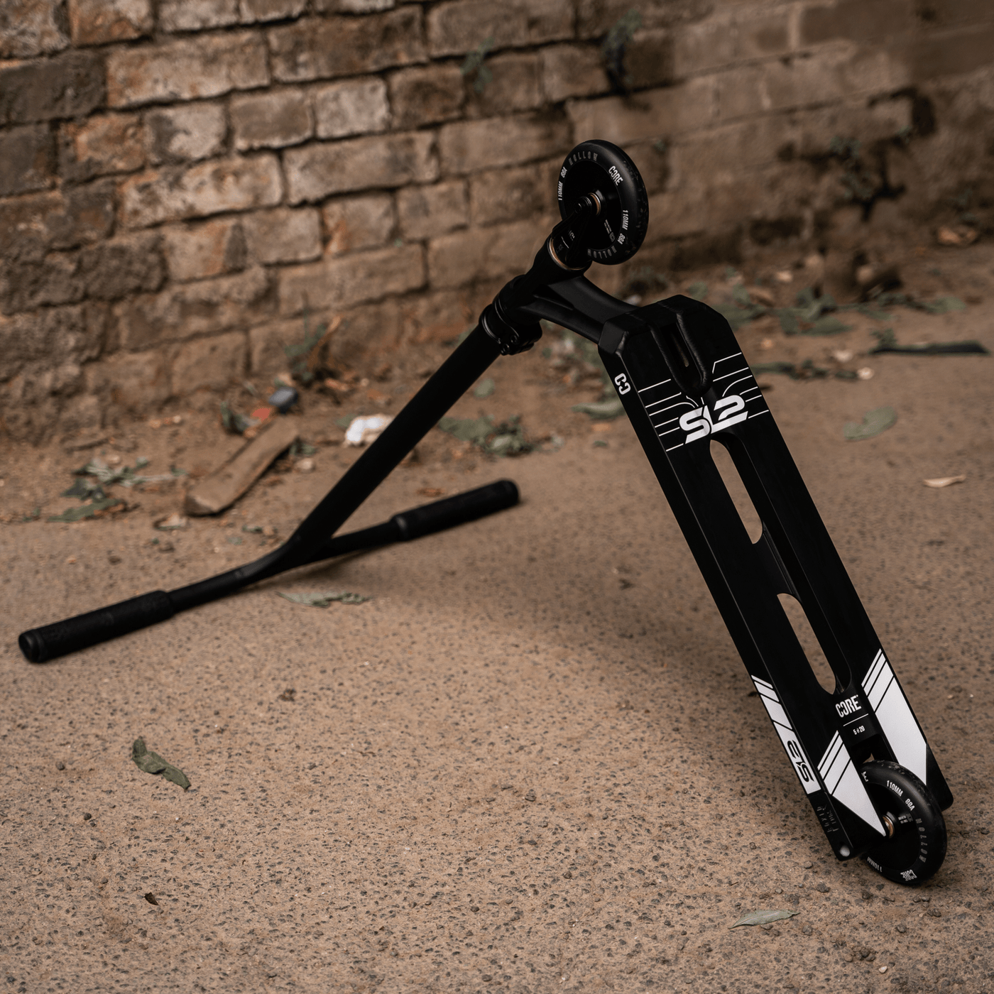 CORE SL2 Stunt Scooter Black I Adult Stunt Scooter Leaning Skatepark