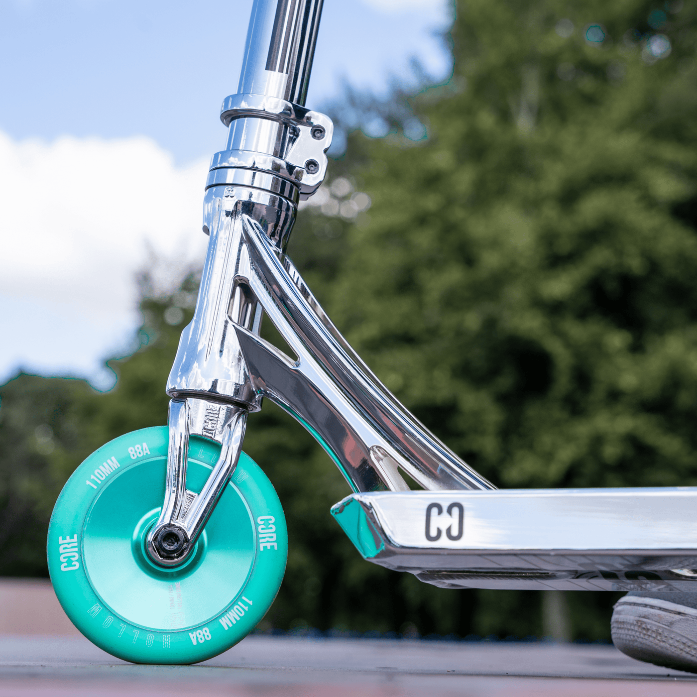 CORE SL2 Stunt Scooter Chrome & Teal I Adult Stunt Scooter Front View Wheel Shoe