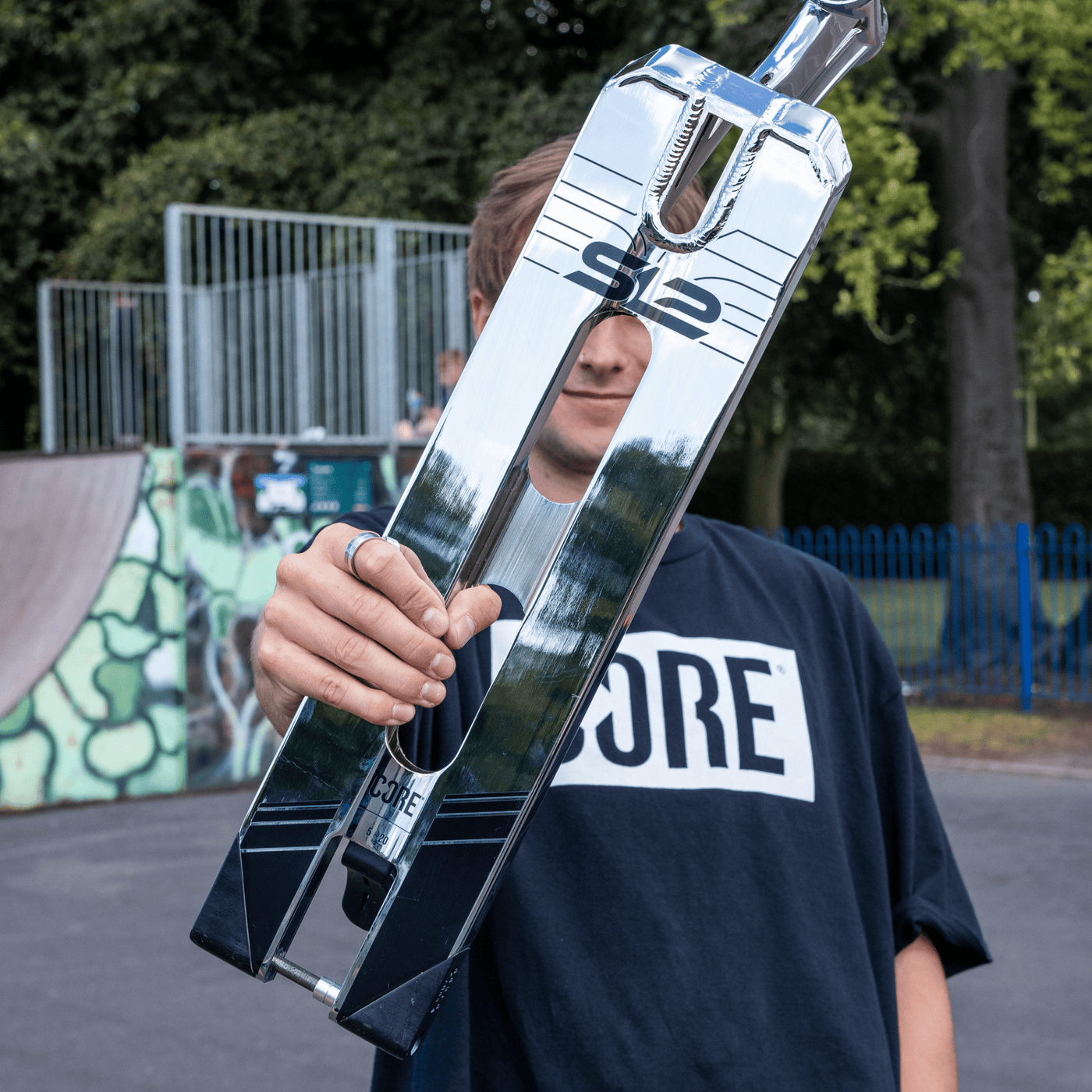 CORE SL2 Stunt Scooter Deck Chrome I Scooter Deck Zoomed Out Holding