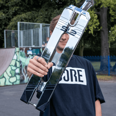 CORE SL2 Stunt Scooter Deck Chrome I Scooter Deck Zoomed Out Holding