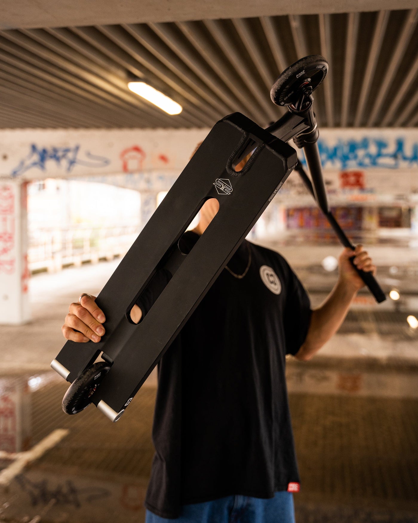 CORE ST2 Stunt Scooter Black I Adult Stunt Scooter Holding Both Hands