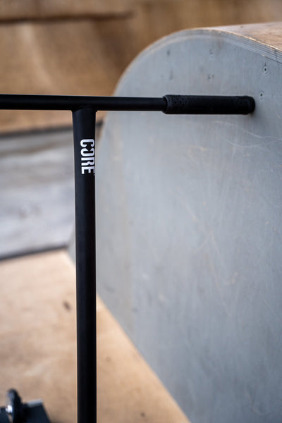 CORE ST2 Stunt Scooter Black & Raw I Adult Stunt Scooter Leaning Ramp