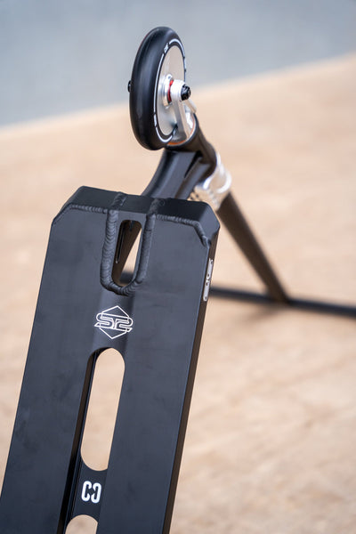 CORE ST2 Stunt Scooter Black & Raw I Adult Stunt Scooter Zoomed Leaning Back